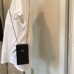 Coach.  New never used cellphone wallet bag